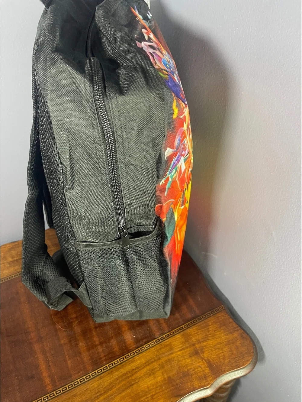 Black Backpack with Colorful Pokémon Print